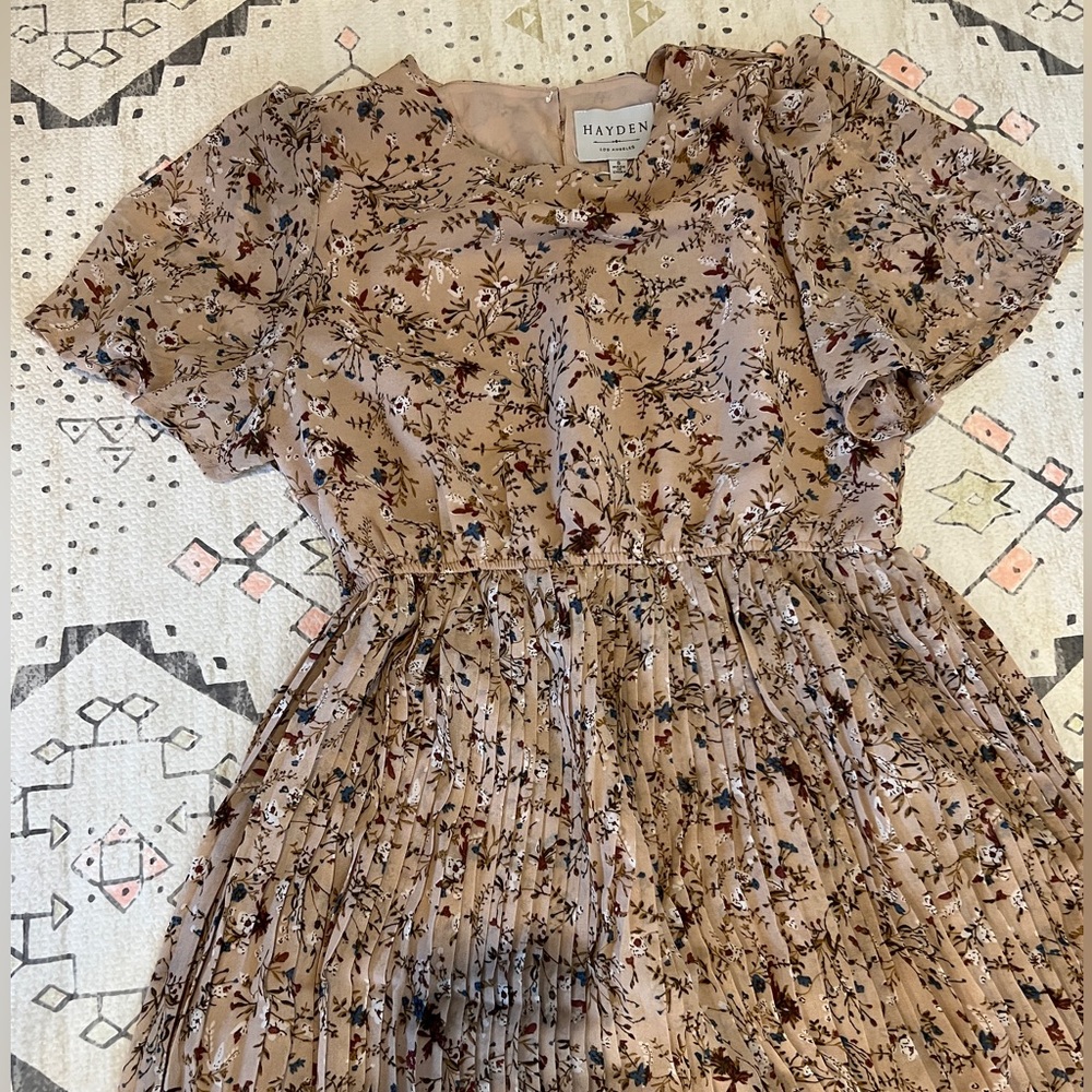 Dress/beige. Never worn. Pleated skirt area. Small.